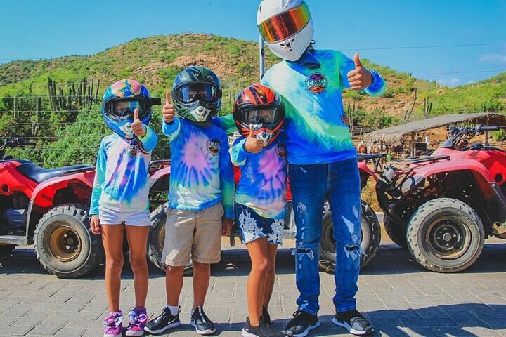 Children geared up for an ATV tour