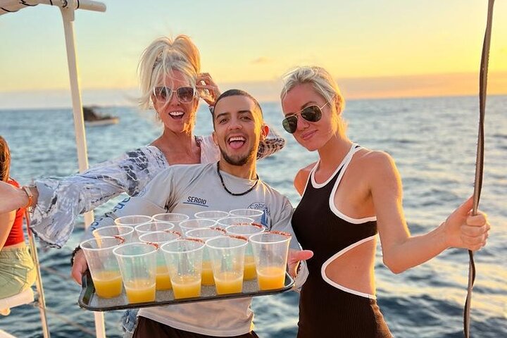 Drinks served on a sunset sail