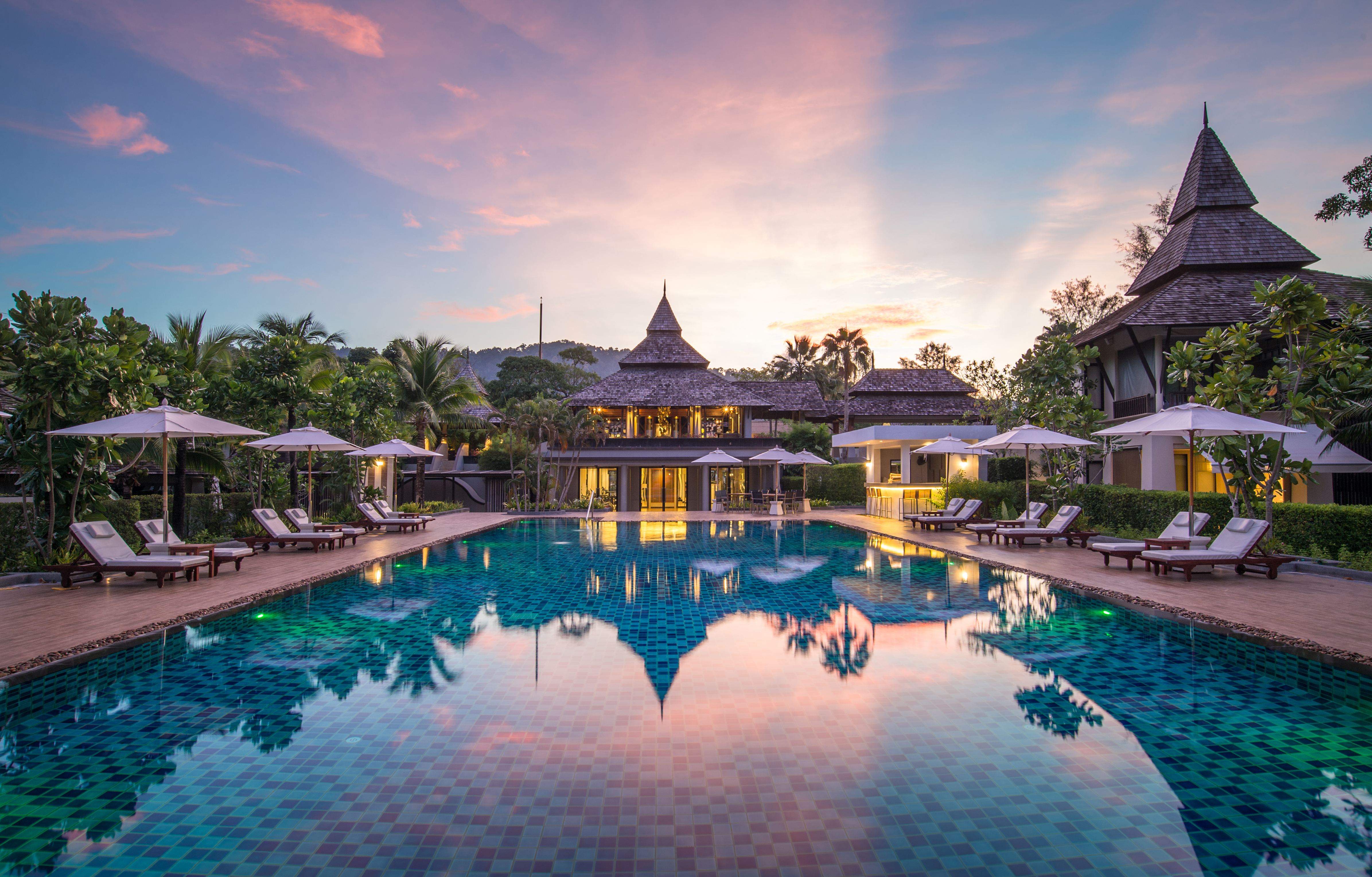 Resort pool at sunset